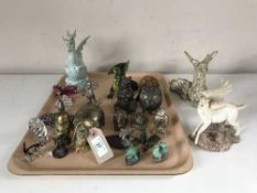 A tray of brass animal ornaments, figures of dragons, dragon belt buckle,