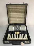 A cased Bell accordion