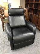 A black leather reclining armchair