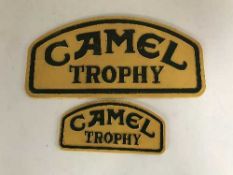 Two cast metal advertising signs - Camel Trophy