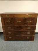 A mahogany campaign style chest of drawers