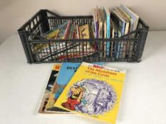 A large quantity of annuals and books relating to Tin Tin, Andy Capp, Astrix,