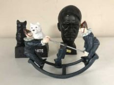 A cast metal clowns on rocking horse figure together with a Black and White Scotch figure and metal