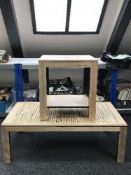 A pine effect coffee table and matching lamp table