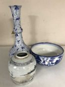 A late 19th century blue and white fluted vase,
