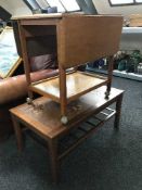 A teak tiled topped kitchen table and a teak trolley