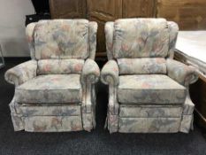 A pair of manual reclining G Plan armchairs