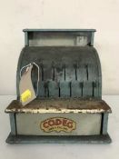 A child's Codeg tin plate cash register