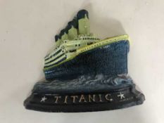 A cast metal Titanic door stop