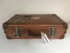 A vintage luggage case and a box of books - birds,