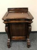 A Victorian style mahogany Davenport