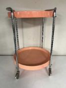 A mid twentieth century chrome two tier trolley with plastic lift off trays