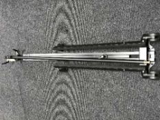 A metal photographic boom arm