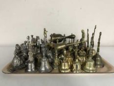 A tray of assorted metal bells