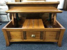 A pine lift top coffee table