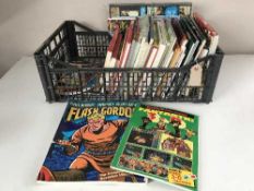 A box of graphic novels and hardback books - Flash Gordon, DIck Tracy,