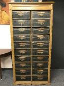 An Edwardian pine multi-drawer chest