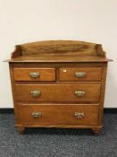 A Victorian pine chest of four drawers