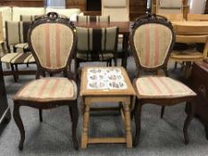 An oak tiled topped drop leaf table