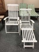 Two painted teak garden armchairs,