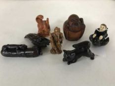 A group of seven carved Japanese netsukes