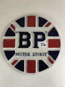 A circular cast metal advertising sign - BP Motor Spirit 25cm