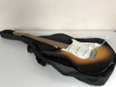 A Peavey Raptor Special electric guitar in carry bag