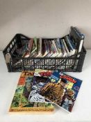 A box of graphic novels and hardback books - Dick Tracy, Buck Rogers,