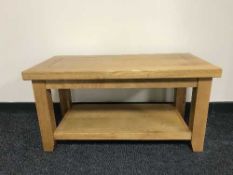 An oak two tier coffee table