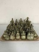 A tray of brass figural bells