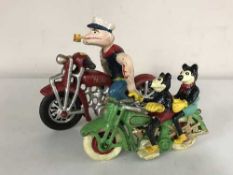 A cast metal figure - Popeye on motorcycle together with Mickey Mouse on motorcycle