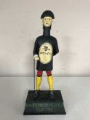 A cast metal Guinness Jockey money box