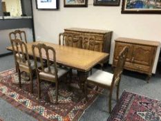 A French oak refectory dining table and six chairs