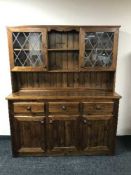 A stained pine kitchen dresser