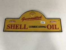 A cast metal dome topped advertising sign,