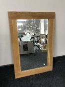 An oak framed over mantle mirror