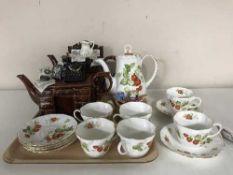 A tray of thirteen piece Queens Virginia Strawberry tea service and two Paul Cardew novelty teapots