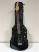 A Yamaha ERG121 electric guitar in carry bag