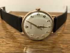 A Gents gold Rolex Precision centre seconds wristwatch with original paperwork,