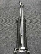 A metal photographic boom arm