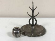 An unusual silver fob,