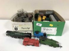 A large pine chest of metal train track, two boxes of part clockwork train,