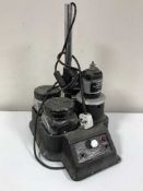 A mid 20th century Green Ray watch clock and instrument cleaner and a National electric watch