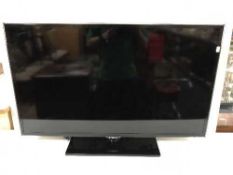A Samsung 40 inch LED TV with remote and a Sony DVD recorder and remote