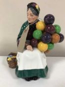 A Royal Doulton figure - The Old Balloon Seller HN 1315