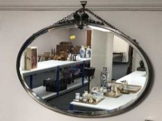 An early 20th century chrome framed mirror