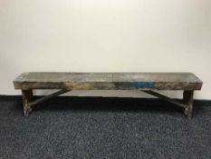 An antique pine school bench