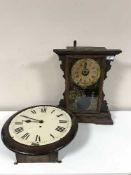 An early 20th century oak school clock and a pine cased American Seth Thomas mantel clock