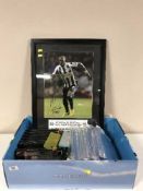 Two boxes of phone covers, tablet cases,