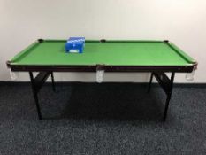 A 6' folding snooker table with set of snooker balls